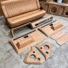 84 C10 custom interior wrapped In Relicate leather with the Mike slosh speaker box.